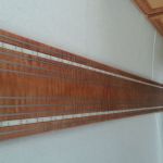 custom steel accents in wood panel 1