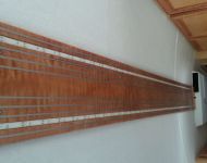 custom steel accents in wood panel 1