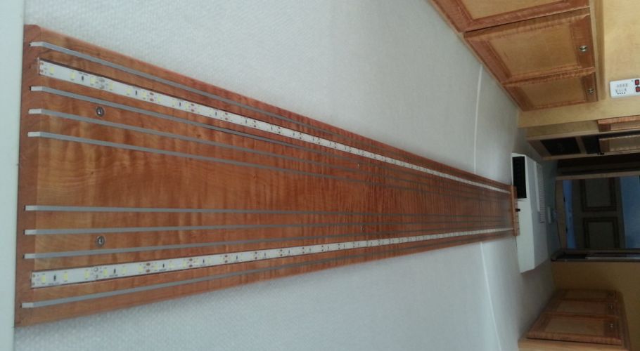 custom steel accents in wood panel 1