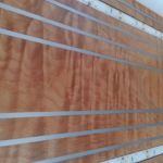 custom steel accents in wood panel